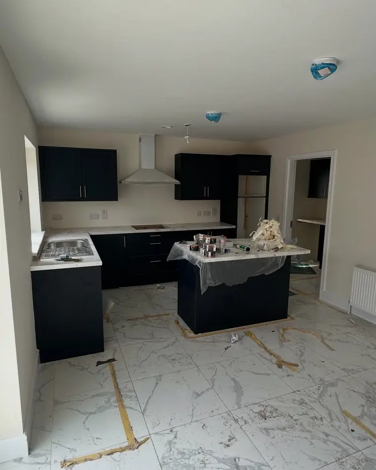 New build kitchen painted top to bottom before handover
