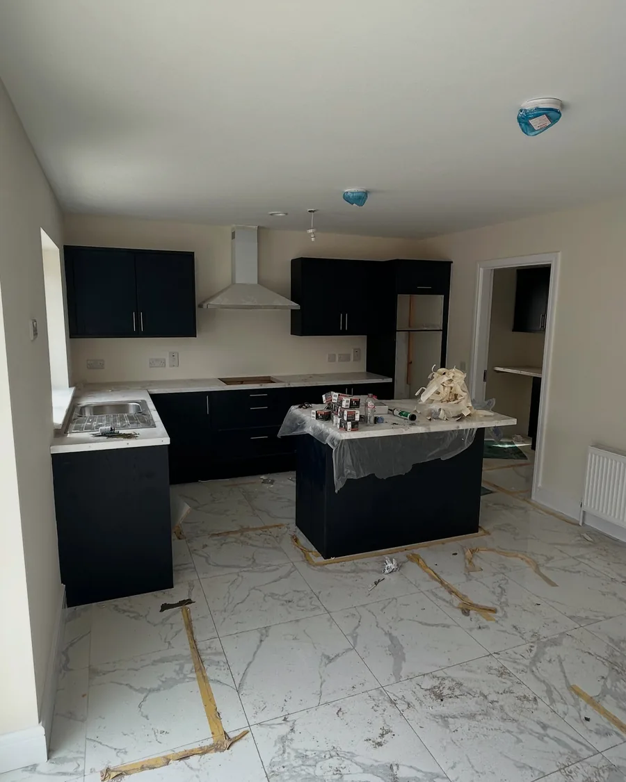 New build kitchen painted top to bottom before handover